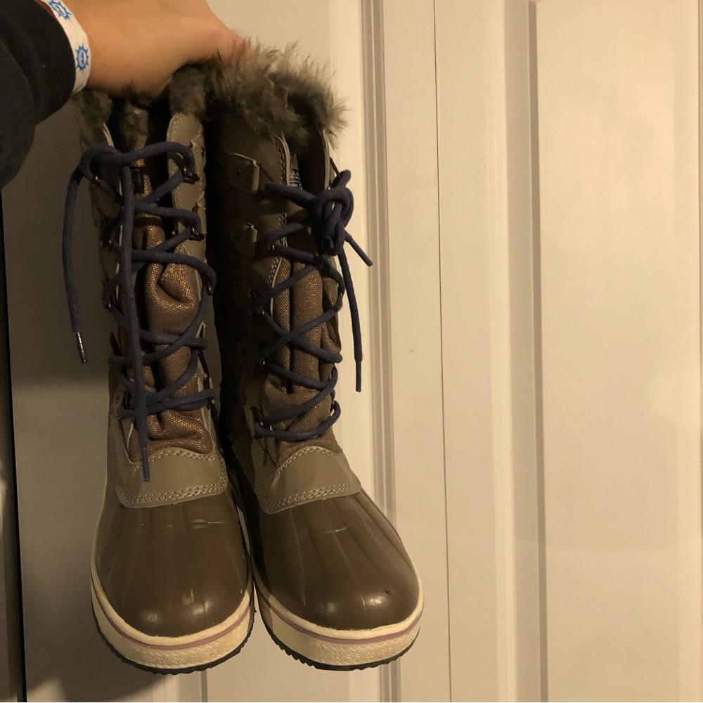 These stylish winter boots will keep your feet warm and dry while looking good.